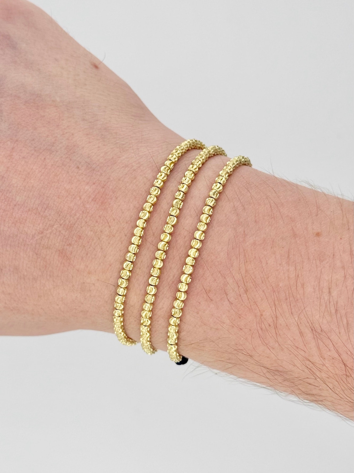 Set de 3 pulseras finas con balines mini diamantados oro laminado 18k foto original NJL Jewelry